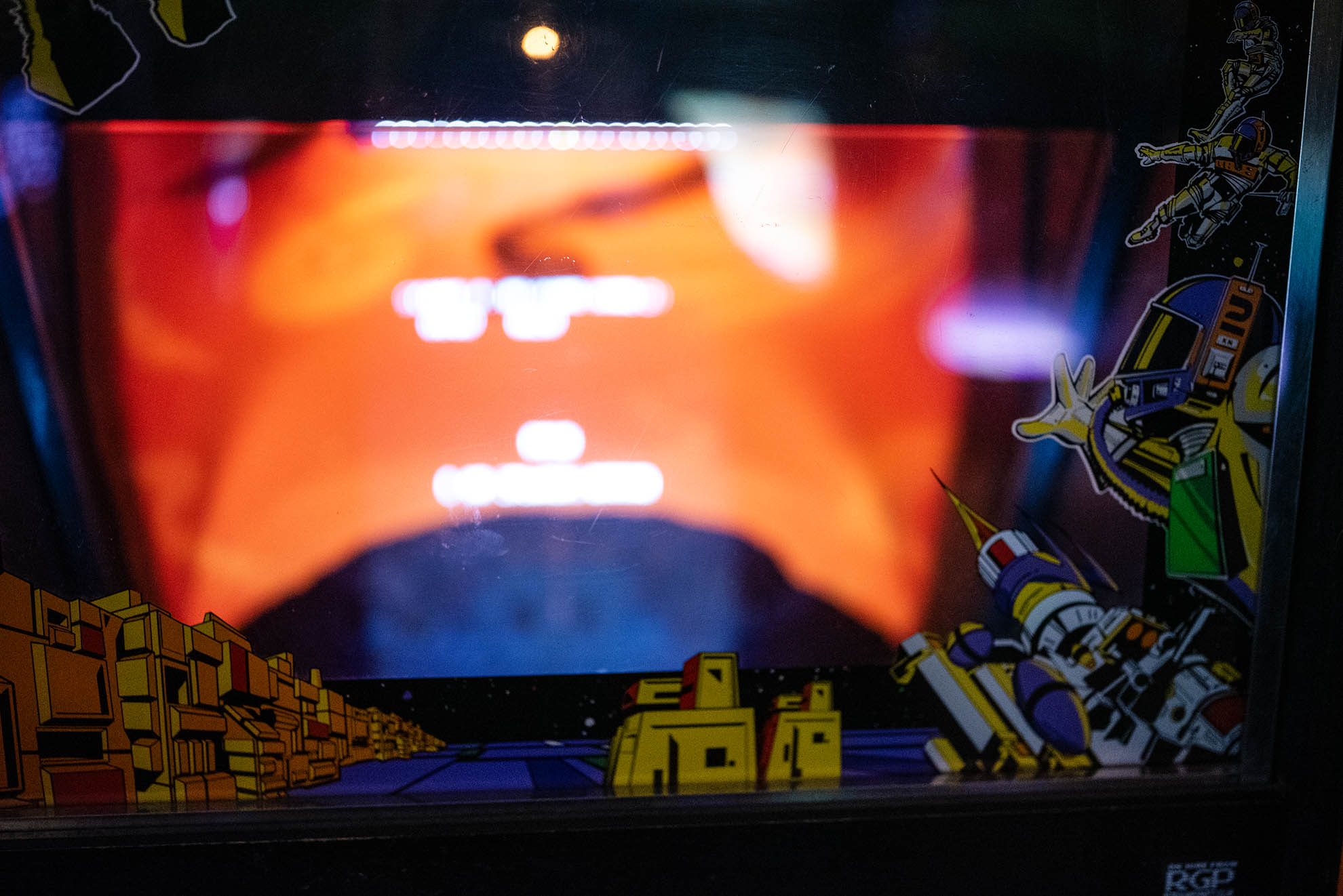 Space Invaders arcade cabinet with gameplay visible