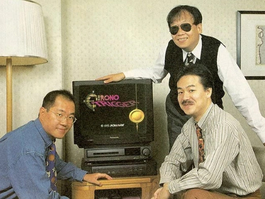 The Dream Team poses with Chrono Trigger: Yuji Horii, Akira Toriyama, and Hironobu Sakaguchi