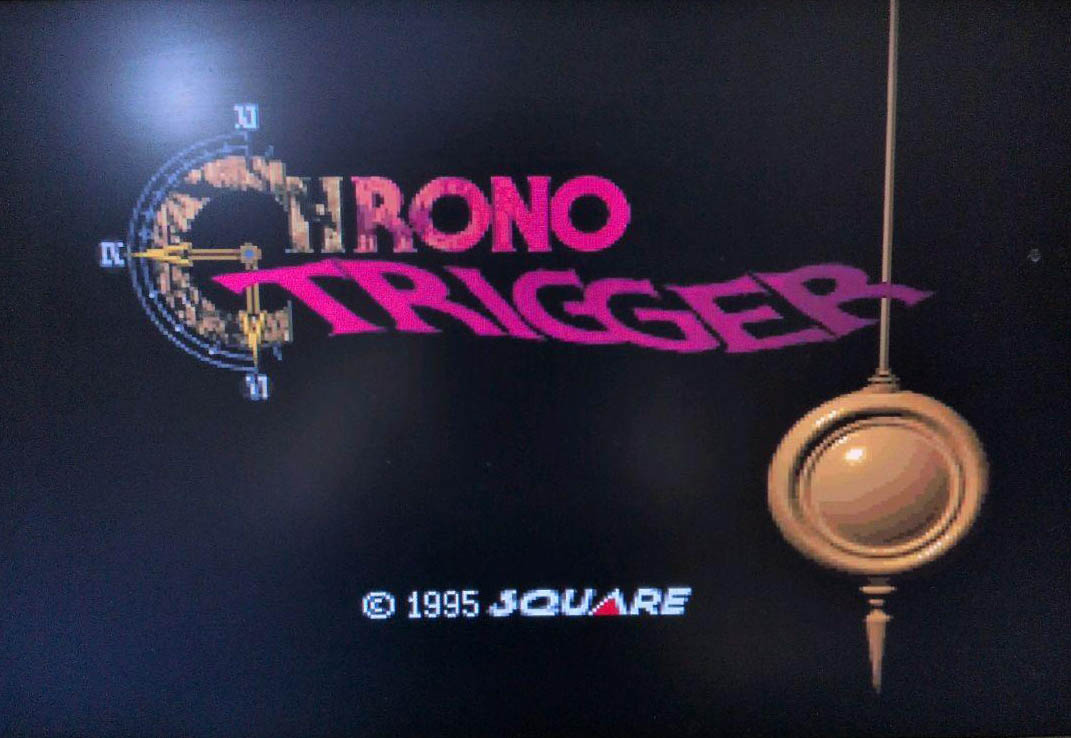 The iconic Chrono Trigger title screen featuring the swinging pendulum